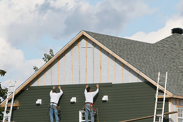 Professional Siding technician working in Snow Camp, NC
